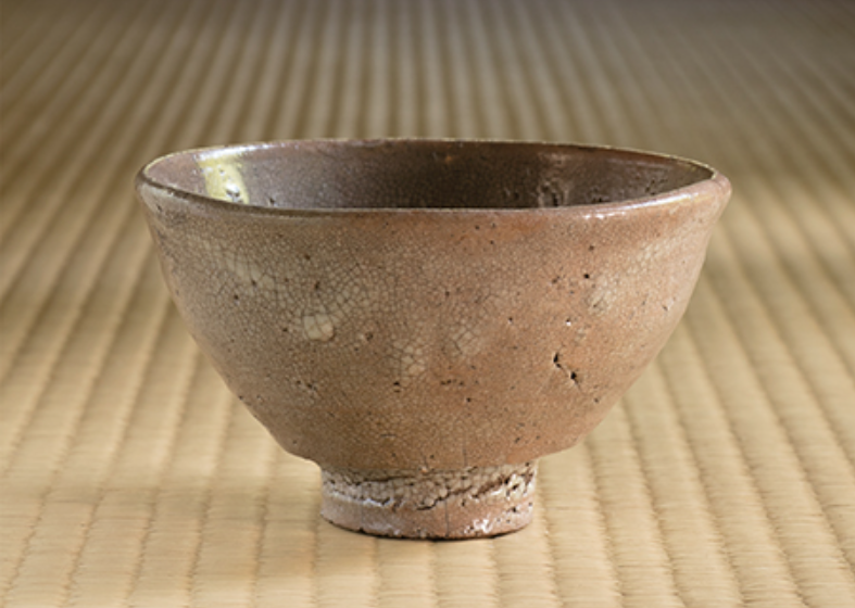 Japanese Hagi ware cup using Korean Buncheong ceramic technique with Korean writing showing how Japanese ceramic styles were influenced by Korean ceramics